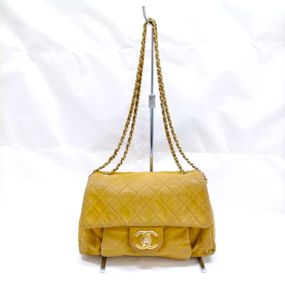 CHANEL Quilted Brown Lambskin Flap Bag